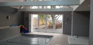 Pool Bifolding Tracked Shutters Installed In Southampton By The Great Shutter Co.